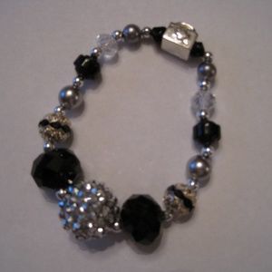 NWOT Silver and Black hand beaded stretch bracelet
